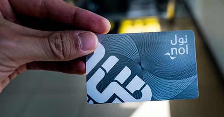 Dubai Metro passenger using nol card at station gate